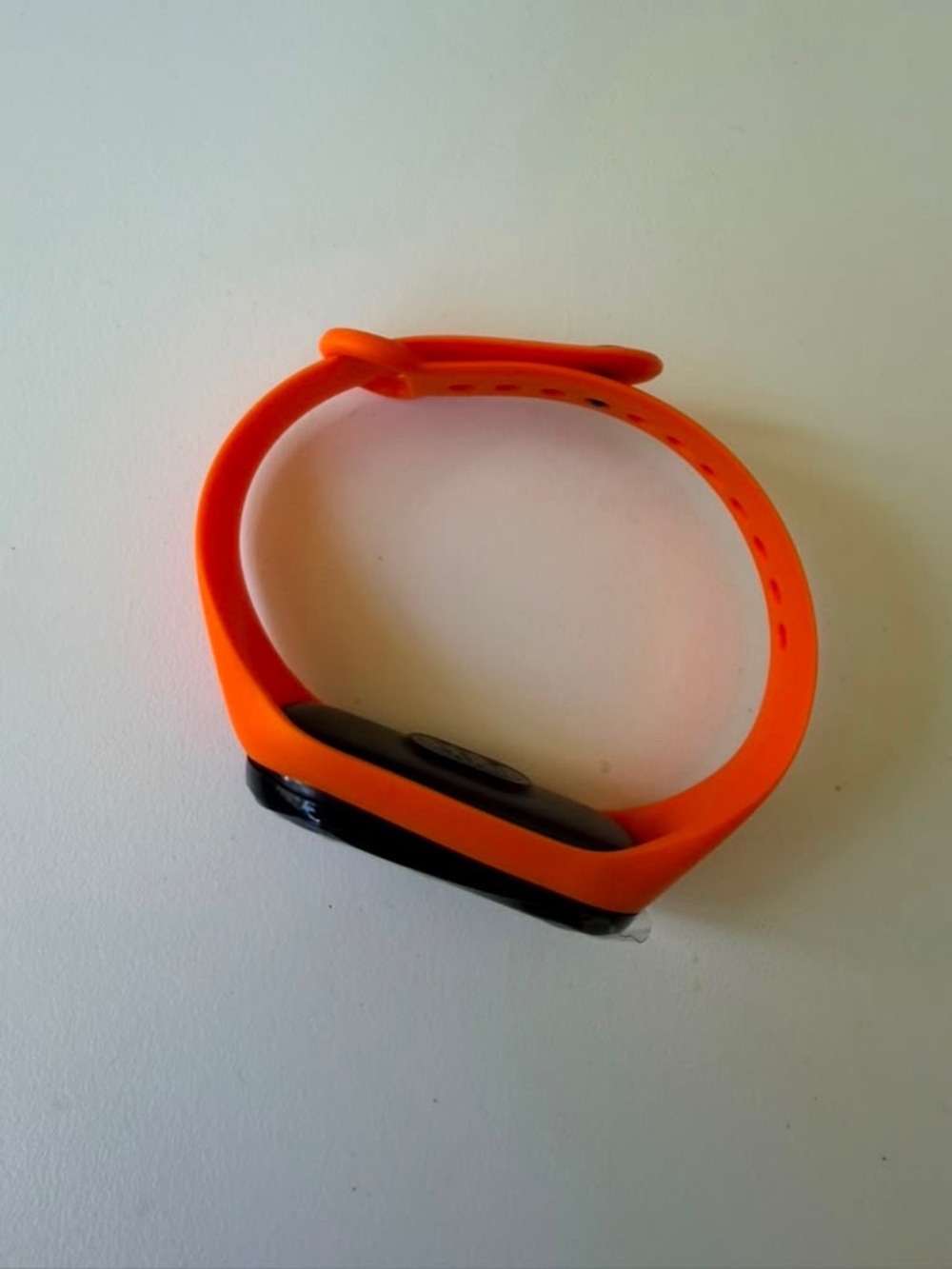 Replaceable Orange Silicone Smartwatch Band with Black Tracker Module